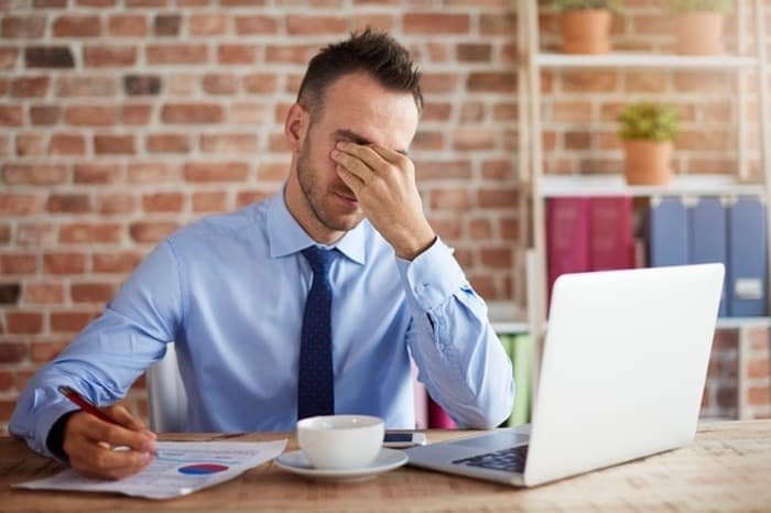 Tired and Unhappy Employee