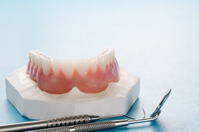 issues with not removing dentures during sleep