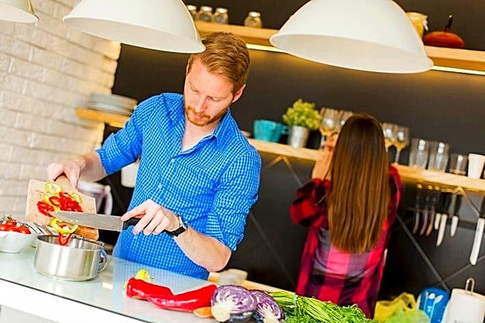 Men assisting with household responsibilities