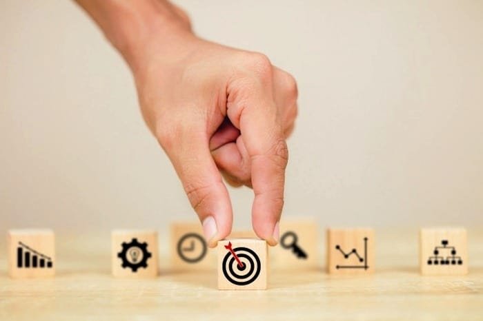 Increasing the likelihood of reaching a goal by writing it down