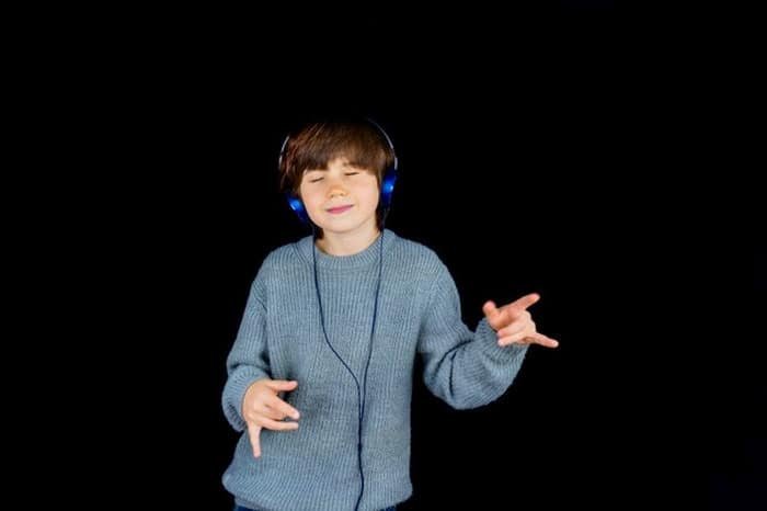 Teaching music to sons.