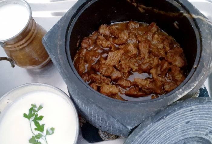 Cooking Food in a Stone Pot